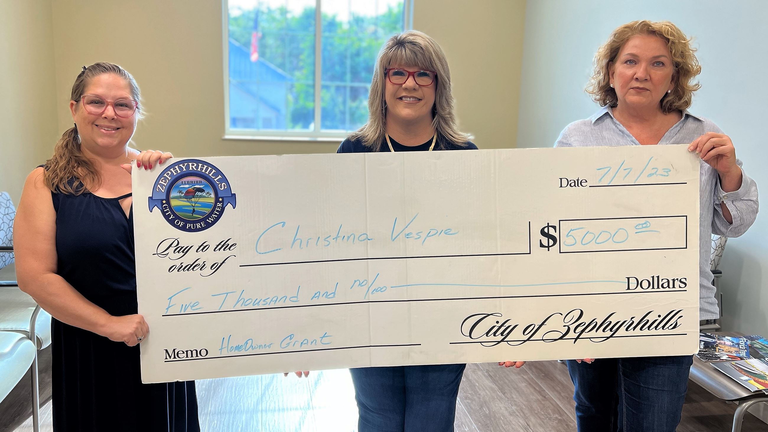 Photo of check presentation for Zephyrhills CRA